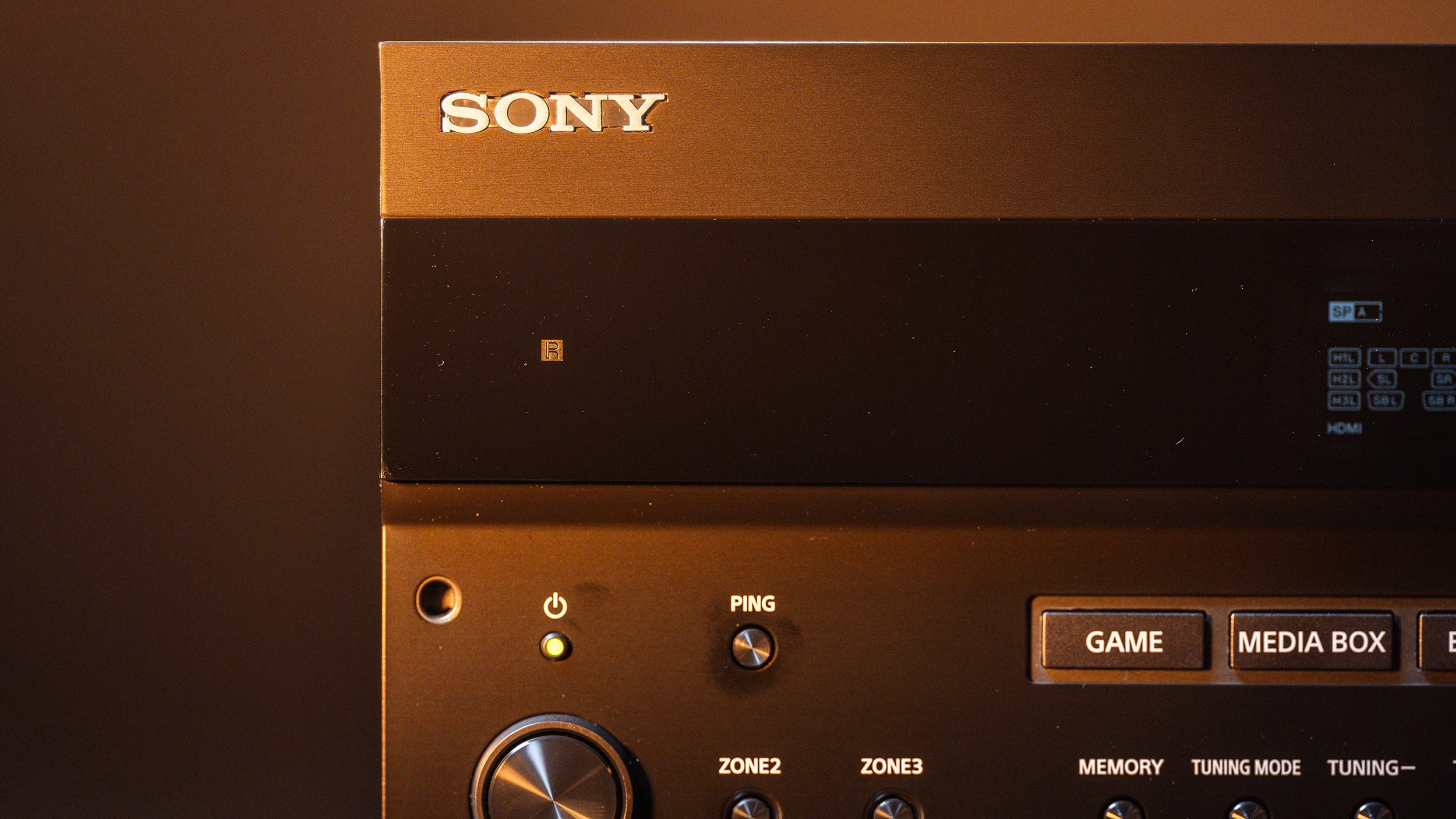 Close-up of Sony receiver buttons and branding