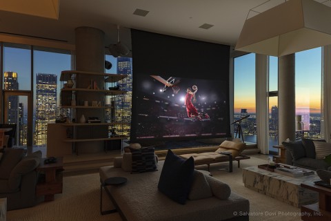 A spectacular New York City penthouse living area with a special, DJ-worthy high-end audio setup.
